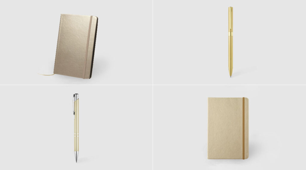 cuadernos y bolígrafos en oro