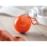 Impermeable publicitario plegado en bola redonda Torrent color naranja segunda vista bodegón principal