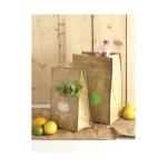 Bolsa térmica estilo retro grande para hasta 12 latas Big Paper color marrón imagen de estilo de vida