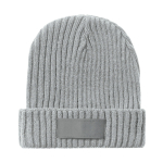Gorro de material acrílico elástico con etiqueta personalizada color gris claro primera vista