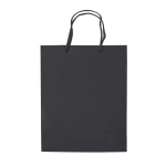 Bolsa mediana de papel laminado de colores con asa de cordón color negro tercera vista