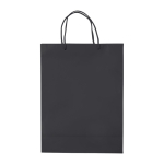 Bolsa grande de papel laminado de colores con asa de cordón color negro tercera vista