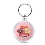 Llavero con forma redonda y cubierta con papeles personalizables