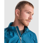 Chaqueta cortavientos unisex de poliéster en tejido técnico ligero 70 g/m2 Roly Direct Glasgow color azul bondi vista detalle 2
