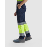 Pantalón laboral de alta visibilidad 250 g/m2 Roly Daily Stretch HV color amarillo fluorescente quinta vista de uso