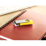 Memoria USB fabricada en ABS con clip de metal giratorio color amarillo