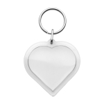 Llavero de plástico con anilla metálica en forma de corazón color transparente primera vista