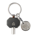 Llavero de zinc reciclado con purgador de radiadores y moneda color negro primera vista