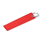 Llavero rectangular tipo ”Remove Before Flight” con anilla metálica color rojo primera vista de uso