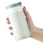 Vaso termo de viaje de acero inoxidable con tapa abatible Dopper 300ml color verde bosque cuarta vista
