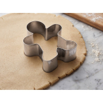 Set de 3 moldes de acero inox. para galletas con formas navideñas color beige vista bodegón