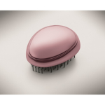 Cepillo de plástico y aluminio para cabello con función desenredante color rosa vista fotografía tercera vista