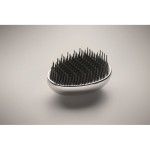 Cepillo de plástico y aluminio para cabello con función desenredante color plateado brillante vista fotografía cuarta vista