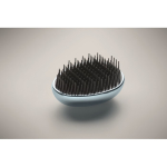 Cepillo de plástico y aluminio para cabello con función desenredante color azul claro vista fotografía cuarta vista
