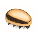 Cepillo de plástico y aluminio para cabello con función desenredante color dorado