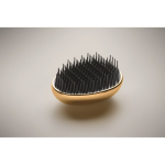 Cepillo de plástico y aluminio para cabello con función desenredante color dorado vista fotografía cuarta vista