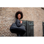 Bolsa de viaje de nylon con apertura rígida y 35L Thule Subterra 2 color negro vista de ambiente 3