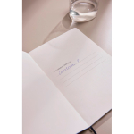 Cuaderno de tapa blanda con papel reciclado A5 hojas a rayas color verde vista de ambiente 2