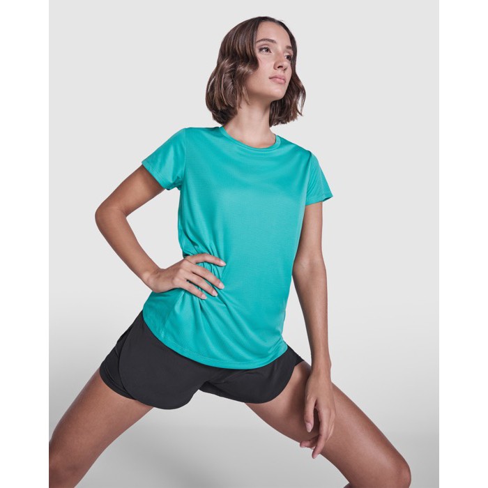 Camiseta técnica de poliéster reciclado para mujer 125 g/m2 Roly Direct Estoril color verde esmeralda primera vista de uso