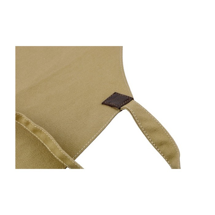 Delantal ajustable de lona con un bolsillo delantero de cuero segunda vista