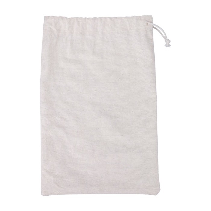 Juego de petanca con pelotas de madera en una bolsa de algodón color marrón primera vista Juego de petanca con pelotas de madera en una bolsa de algodón color marrón primera vista