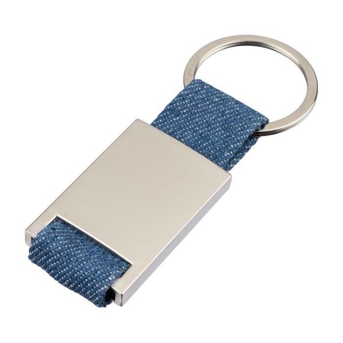 Llavero de zinc personalizable con detalle de tela vaquera primera vista Llavero de zinc personalizable con detalle de tela vaquera primera vista