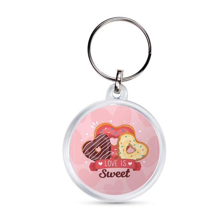 Llavero con forma redonda y cubierta con papeles personalizables vista con logo impreso Llavero con forma redonda y cubierta con papeles personalizables vista con logo impreso