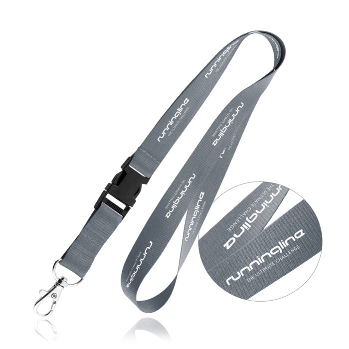 Lanyard de poliéster de 2cm con tip top y mosquetón metálico color gris oscuro Lanyard de poliéster de 2cm con tip top y mosquetón metálico color gris oscuro