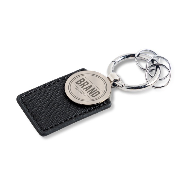 Llavero con 3 minianillas de fácil apertura con parche incorporado color negro vista con logo impreso Llavero con 3 minianillas de fácil apertura con parche incorporado color negro vista con logo impreso