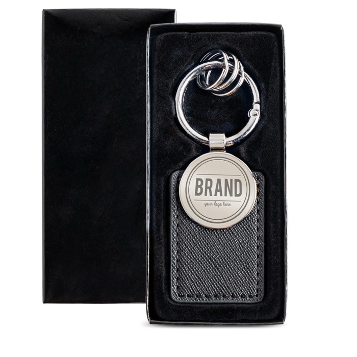 Llavero con 3 minianillas de fácil apertura con parche incorporado vista con logo impreso Llavero con 3 minianillas de fácil apertura con parche incorporado vista con logo impreso