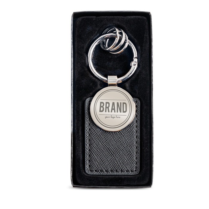 Llavero con 3 minianillas de fácil apertura con parche incorporado vista con logo impreso Llavero con 3 minianillas de fácil apertura con parche incorporado vista con logo impreso