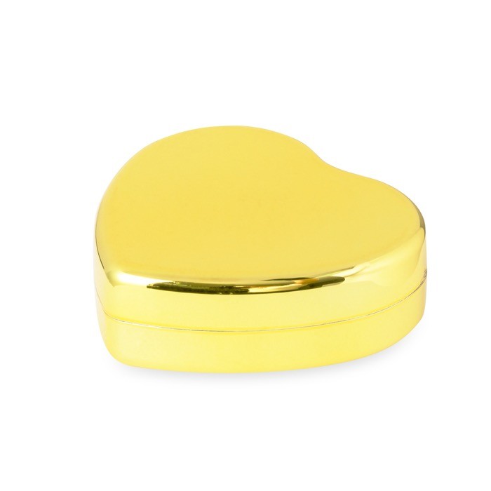 Bálsamo labial de aroma a vainilla y SPF15 en forma de corazón color dorado primera vista Bálsamo labial de aroma a vainilla y SPF15 en forma de corazón color dorado primera vista