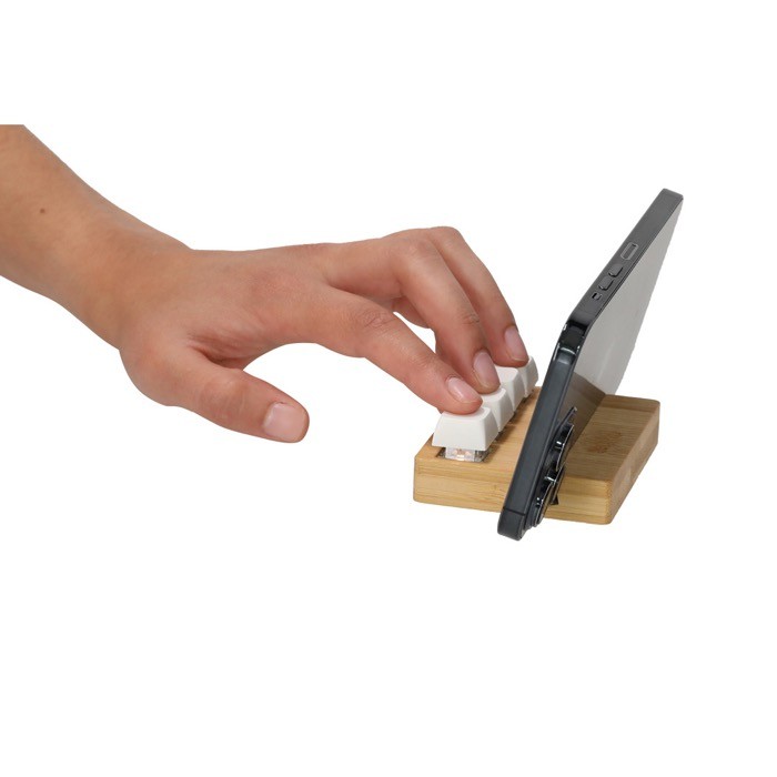Soporte para móvil con teclado mecánico de funcionalidad antiestrés cuarta vista
