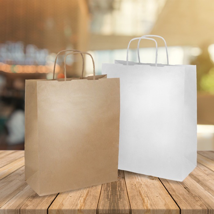 Bolsa clásica de papel kraft con asas cortas y gramaje 90 g/m2 vista de ambiente Bolsa clásica de papel kraft con asas cortas y gramaje 90 g/m2 vista de ambiente