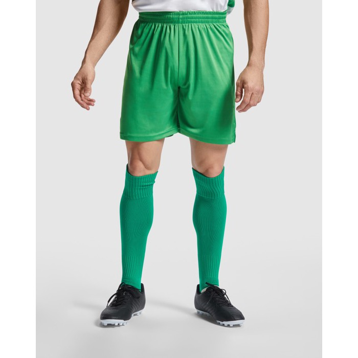 Pantalón deportivo corto de poliéster 140 g/m2 Roly Direct Dortmund color verde primera vista de uso Pantalón deportivo corto de poliéster 140 g/m2 Roly Direct Dortmund color verde primera vista de uso