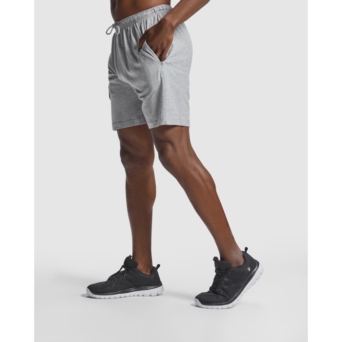 Pantalón corto unisex con cintura elástica 200 g/m2 Roly Direct Sport color azul marino quinta vista de uso Pantalón corto unisex con cintura elástica 200 g/m2 Roly Direct Sport color azul marino quinta vista de uso