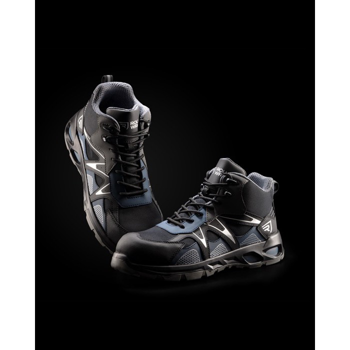 Botín de trabajo estilo deportivo con puntera de fibra de vidrio Roly color azul marino cuarta vista de uso Botín de trabajo estilo deportivo con puntera de fibra de vidrio Roly color azul marino cuarta vista de uso