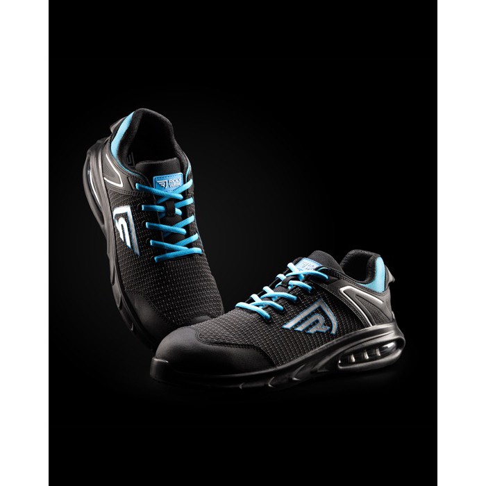 Zapato laboral con cámara de aire de amortiguación avanzada Roly color azul real cuarta vista de uso Zapato laboral con cámara de aire de amortiguación avanzada Roly color azul real cuarta vista de uso