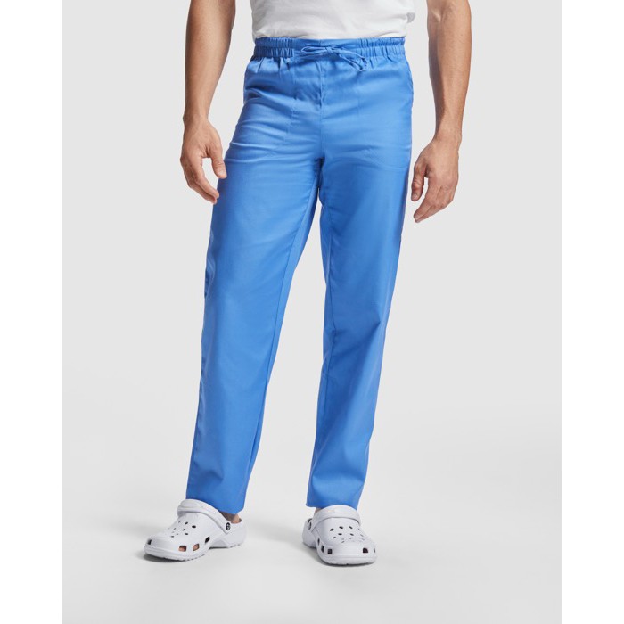 Pantalón sanitario largo unisex con corte recto 195 g/m2 Roly Care color azul bondi primera vista de uso