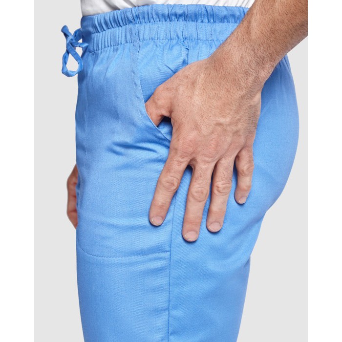 Pantalón sanitario largo unisex con corte recto 195 g/m2 Roly Care color azul bondi vista detalle 2
