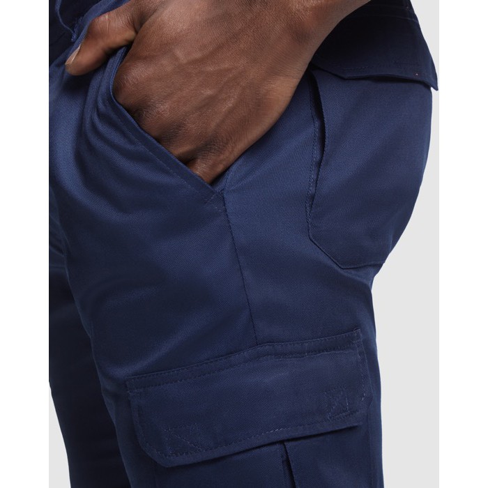 Pantalón laboral alta visibilidad con bolsillos 200 g/m2 Roly Naos color naranja fluorescente vista detalle 1