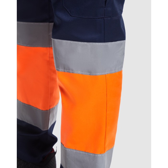 Pantalón laboral alta visibilidad con bolsillos 200 g/m2 Roly Naos color naranja fluorescente vista detalle 2