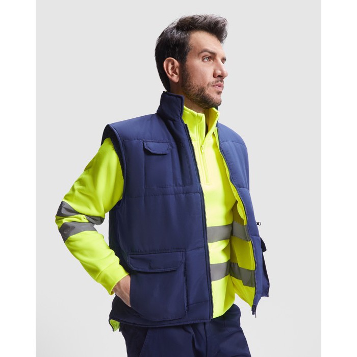 Chaleco laboral reversible alta visibilidad 450 g/m2 Roly Persei color amarillo fluorescente primera vista de uso