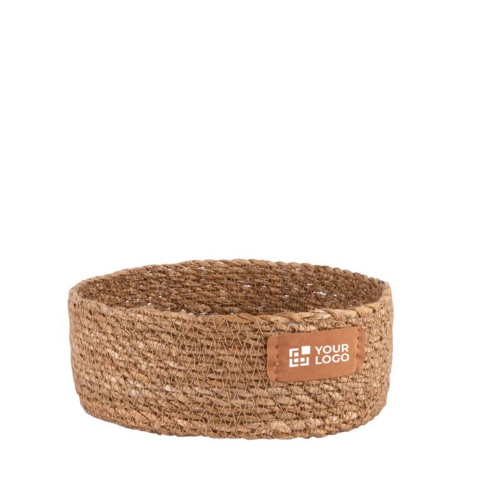 Cesta redonda de almacenamiento hecha de algas entretejidas color marrón vista principal Cesta redonda de almacenamiento hecha de algas entretejidas color marrón vista principal