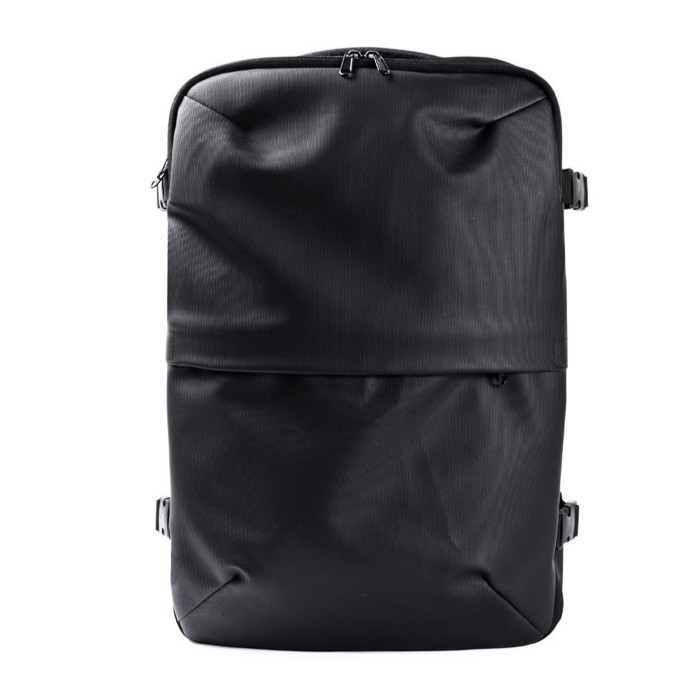 Mochila de cuero sintético para viajes con función expandible 30L color negro primera vista