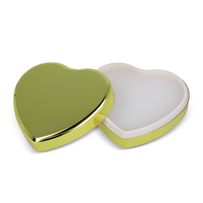 Bálsamo labial en estuche metálico en forma de corazón color dorado segunda vista Bálsamo labial en estuche metálico en forma de corazón color dorado segunda vista
