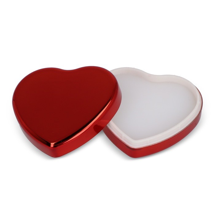 Bálsamo labial en estuche metálico en forma de corazón color rojo segunda vista Bálsamo labial en estuche metálico en forma de corazón color rojo segunda vista