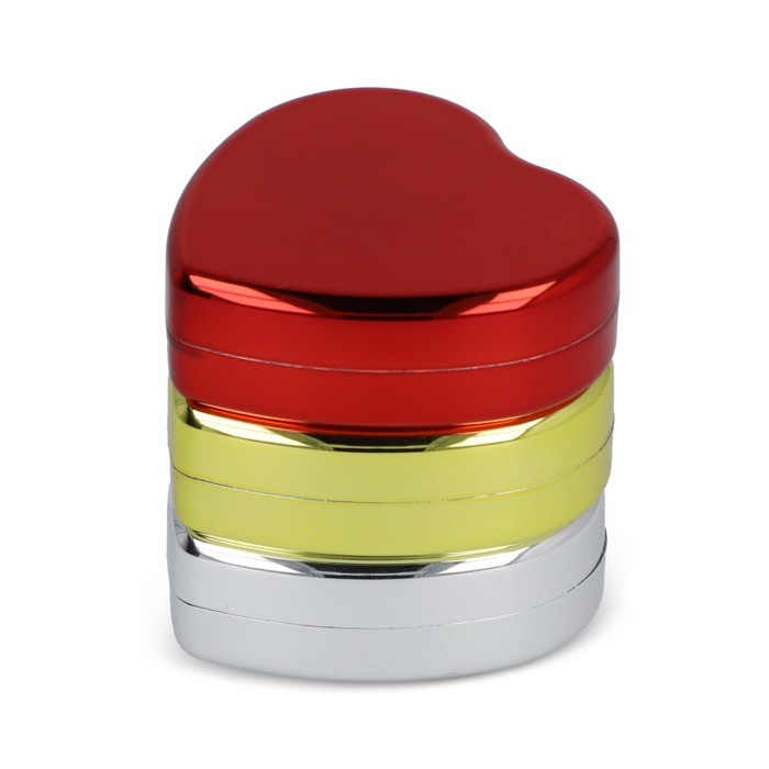 Bálsamo labial en estuche metálico en forma de corazón tercera vista Bálsamo labial en estuche metálico en forma de corazón tercera vista