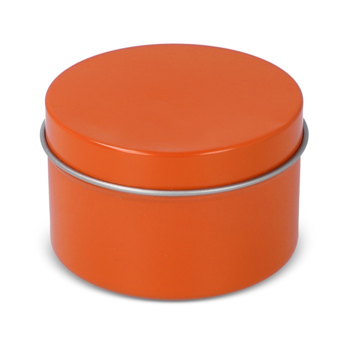 Vela de cera vegetal en tarro monocromático de acero reciclado circular color naranja Vela de cera vegetal en tarro monocromático de acero reciclado circular color naranja
