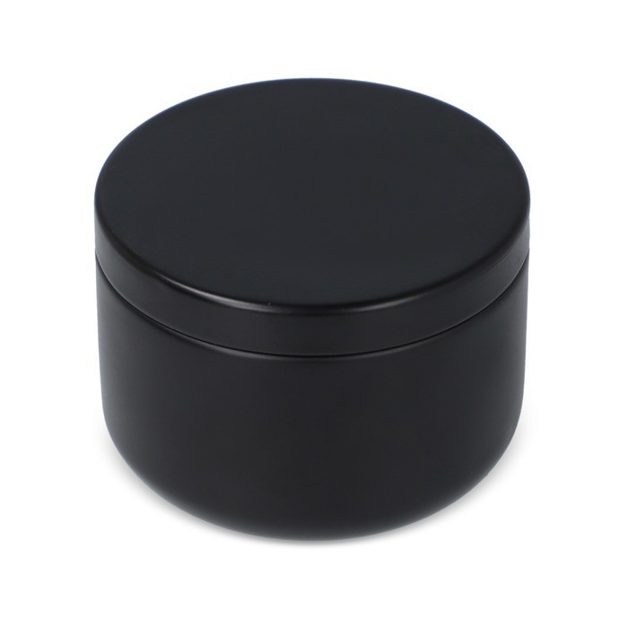 Vela de cera vegetal en tarro de acero reciclado circular color negro Vela de cera vegetal en tarro de acero reciclado circular color negro